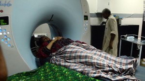 An earthquake survivor undergoes tests at a hospital in Karachi
